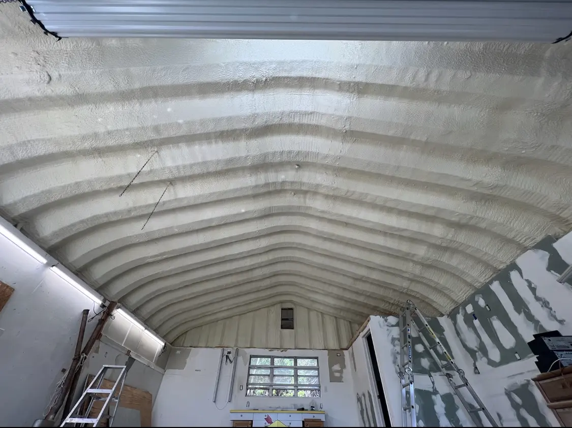 Spray polyurethane foam applied to the underside of a metal roof deck in Walkersville